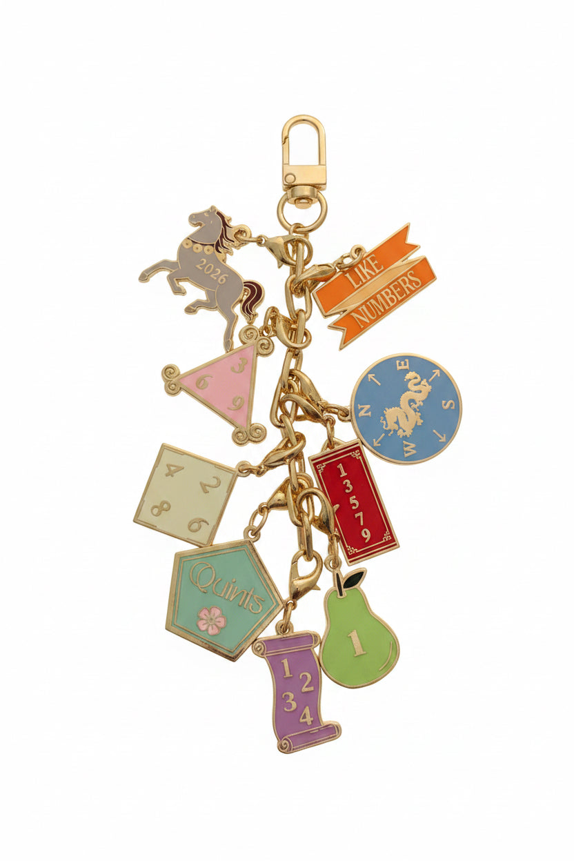 Set of SoloMahj gold cloisonne mahjong card section charms displayed together