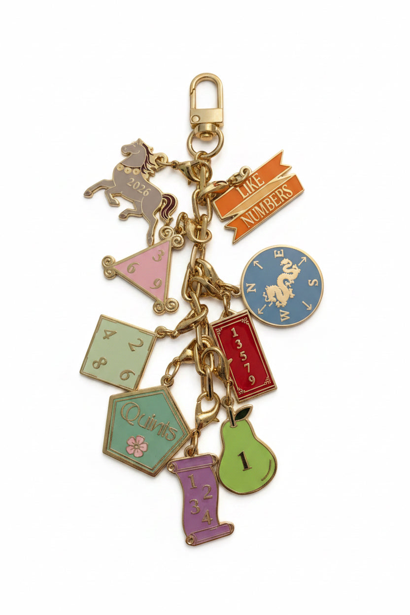 Set of SoloMahj gold cloisonne mahjong card section charms displayed together